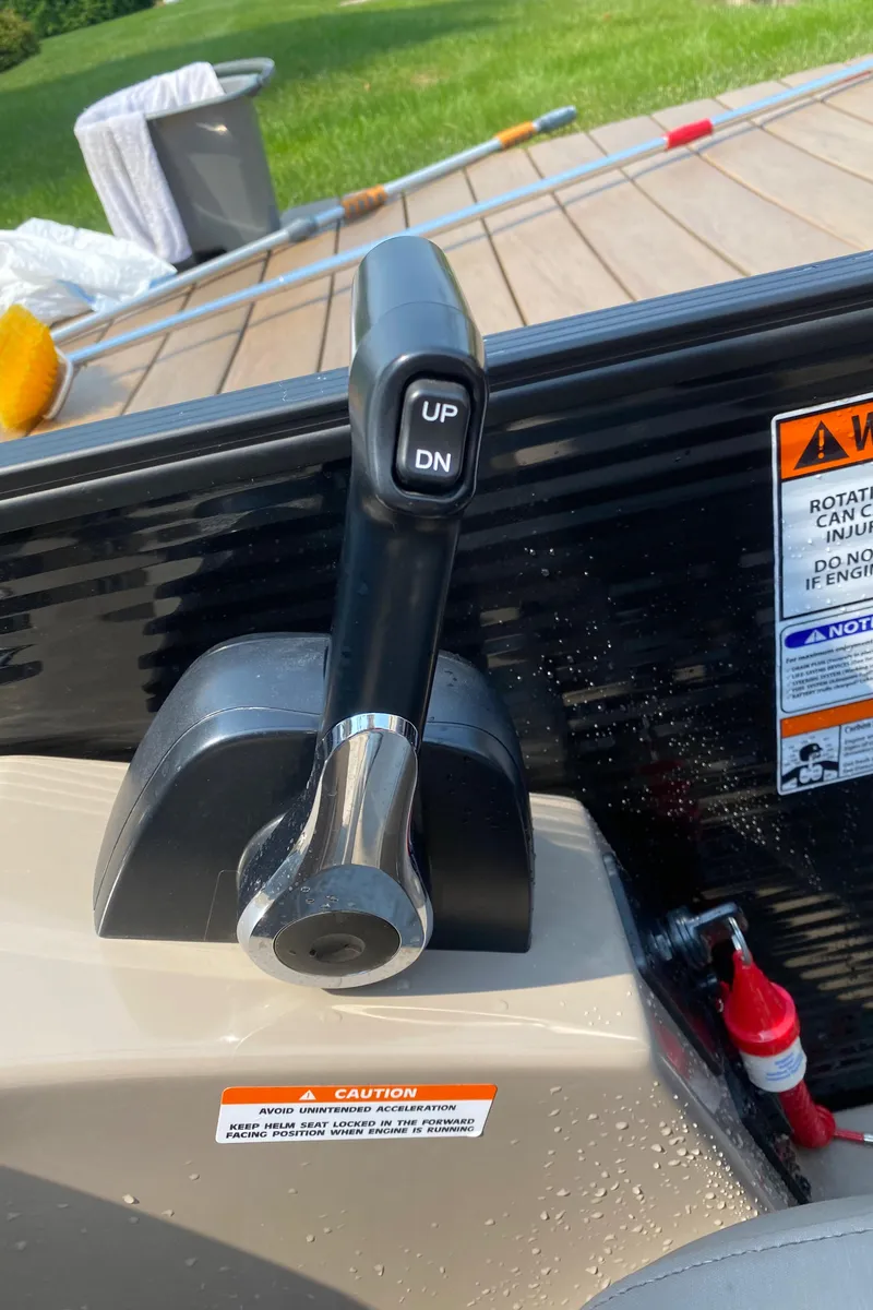 Slide: The Image of Close-up of throttle control on a 2018 Bennington G25 boat. - 21
