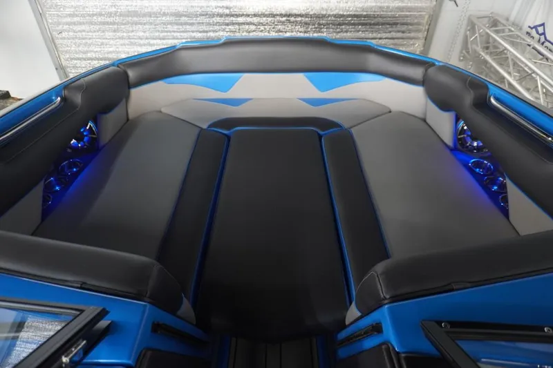 Slide: The Image of Interior of 2021 Moomba Makai with blue and gray upholstery. - 18