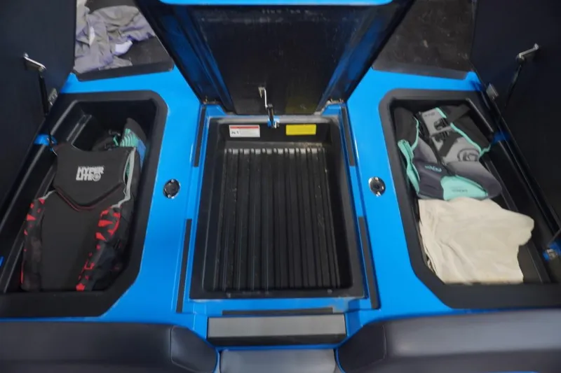 Slide: The Image of Storage compartments in 2021 Moomba Makai boat with life vests. - 20
