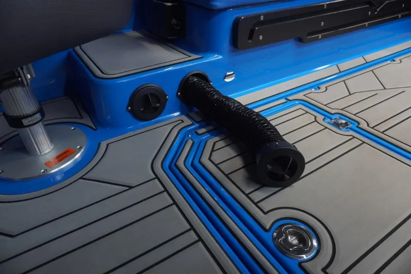 Slide: The Image of Interior of 2021 Moomba Makai with blue and gray accents. - 21