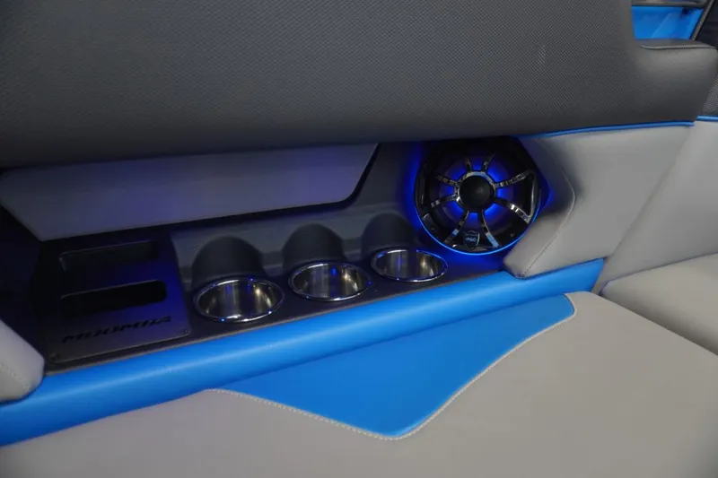 Slide: The Image of 2021 Moomba Makai interior with speaker and cup holders. - 23