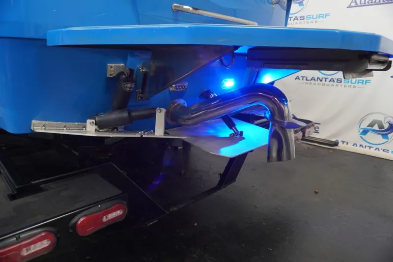 Slide: The Image of Rear view of a 2021 Moomba Makai with blue lighting. - 7