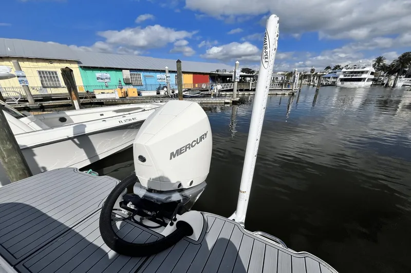 Slide: The Image of 2019 Sea Ray SDX 270 Outboard with Mercury engine docked at marina. - 4
