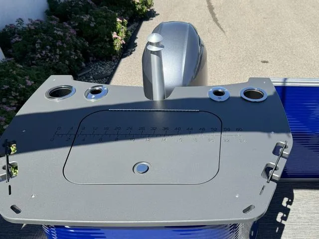 Slide: The Image of 2024 Bennington 20 SVF boat stern with motor and fishing rod holders. - 16