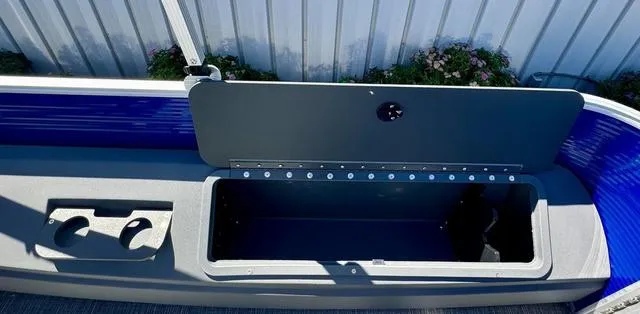 Slide: The Image of 2024 Bennington 20 SVF boat storage compartment with cup holders. - 18