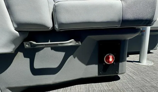 Slide: The Image of 2024 Bennington 20 SVF boat seat with storage handle and red switch. - 22