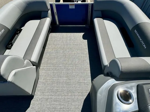 Slide: The Image of 2024 Bennington 20 SVF boat interior with gray seating and flooring. - 5