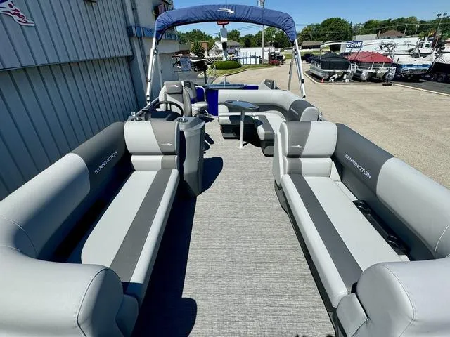Slide: The Image of 2024 Bennington 20 SVF pontoon boat with spacious seating and canopy. - 7
