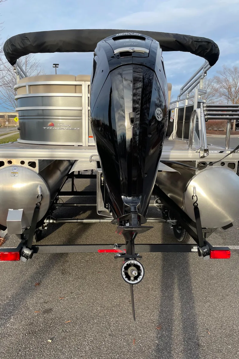 Slide: The Image of 2024 Sun Tracker Party Barge 20 DLX pontoon boat with outboard motor. - 5