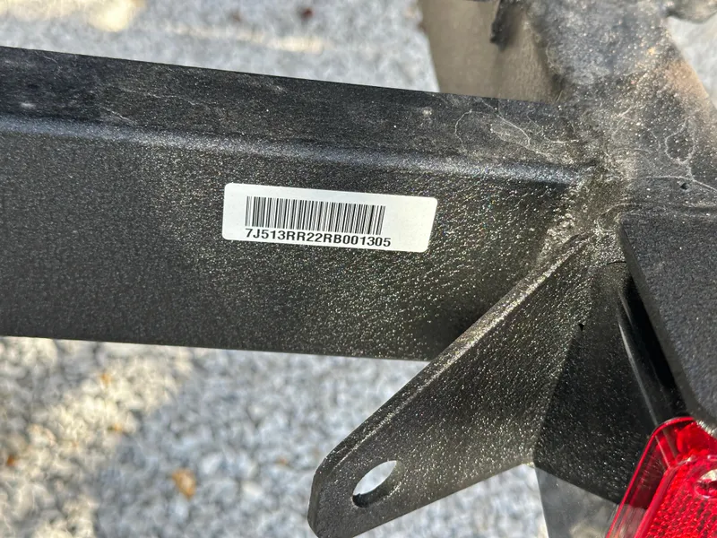 Slide: The Image of Close-up of a 2024 Sun Tracker Party Barge 22 RF XP3 trailer serial number. - 20