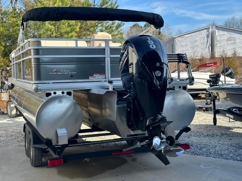 Slide: The Image of 2024 Sun Tracker Party Barge 22 RF XP3 pontoon boat with outboard motor. - 5