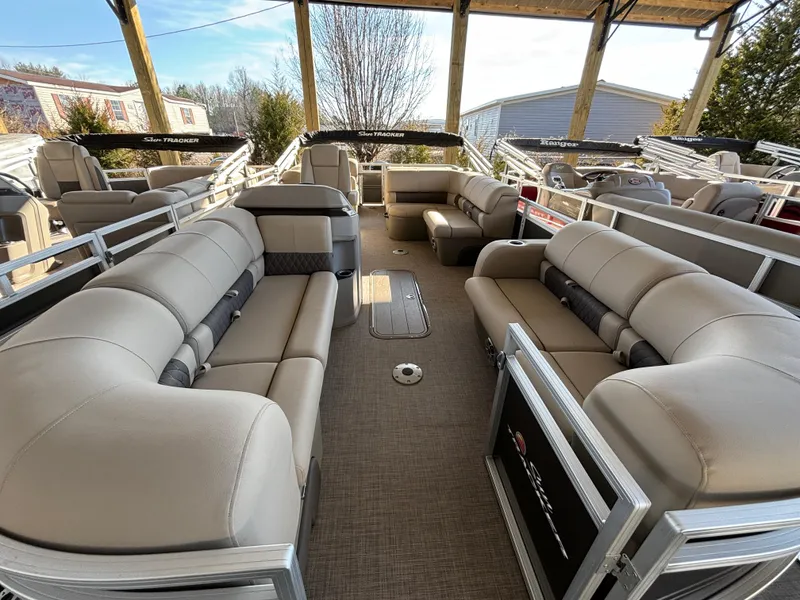 Slide: The Image of 2024 Sun Tracker Party Barge 22 RF XP3 interior with spacious seating and modern design. - 6