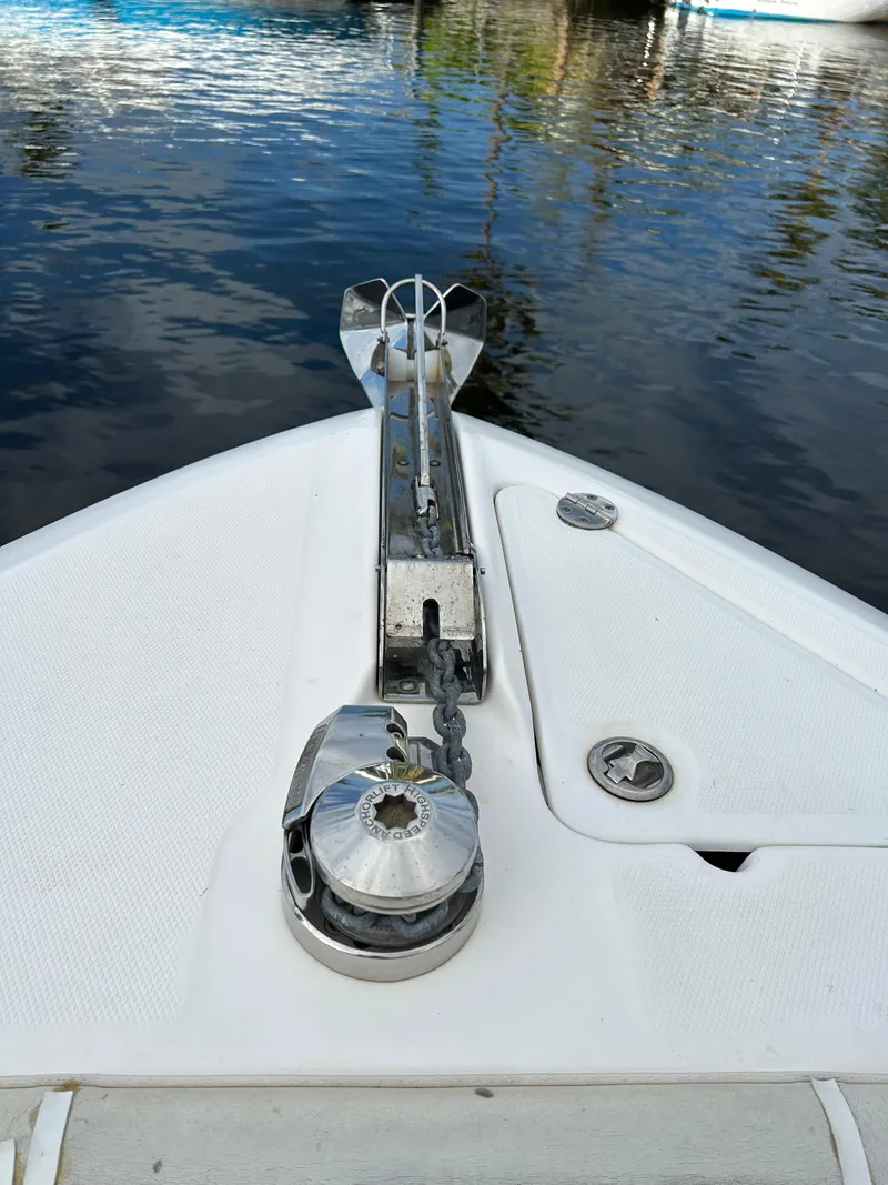 Slide: The Image of 2012 Everglades 295 Center Console boat anchor system on calm water. - 9