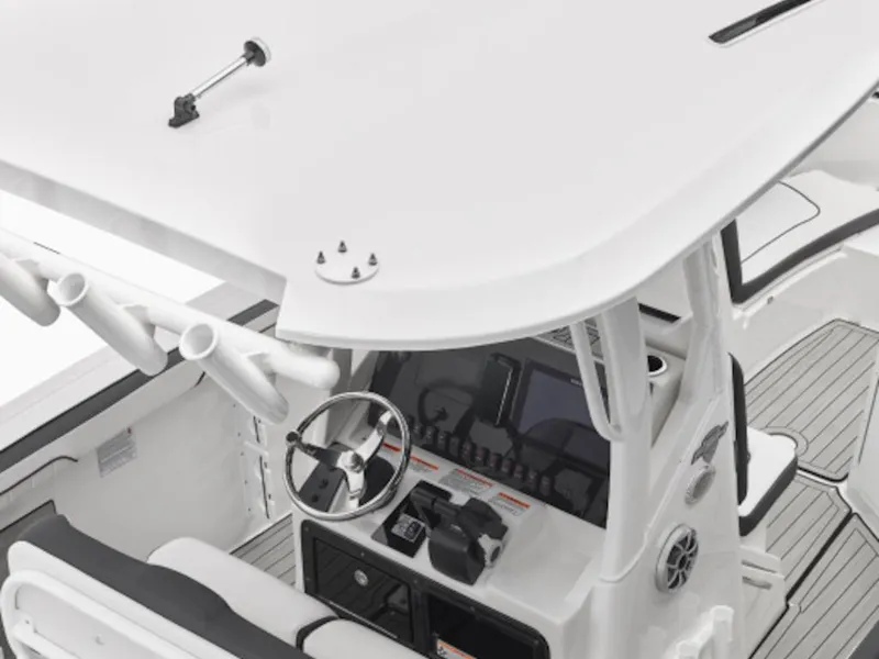 Slide: The Image of 2024 Yamaha Boats 255 FSH Sport E cockpit with steering wheel and control panel. - 5