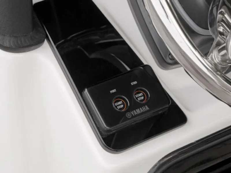 Slide: The Image of Yamaha Boats 2024 255 FSH Sport E start/stop buttons near steering wheel. - 7