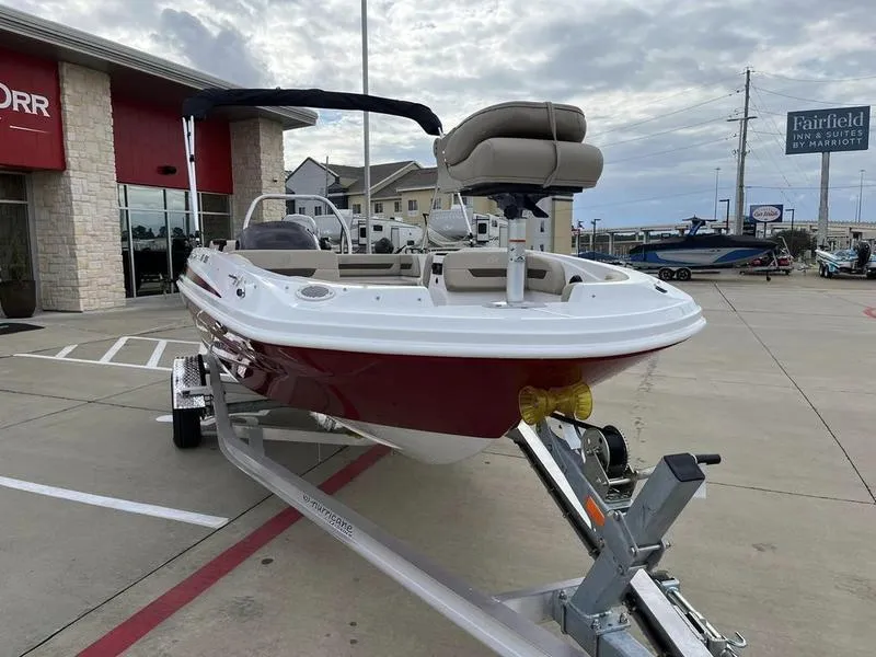 Slide: The Image of 2023 Hurricane SS185-OB boat on trailer in dealership parking lot. - 3