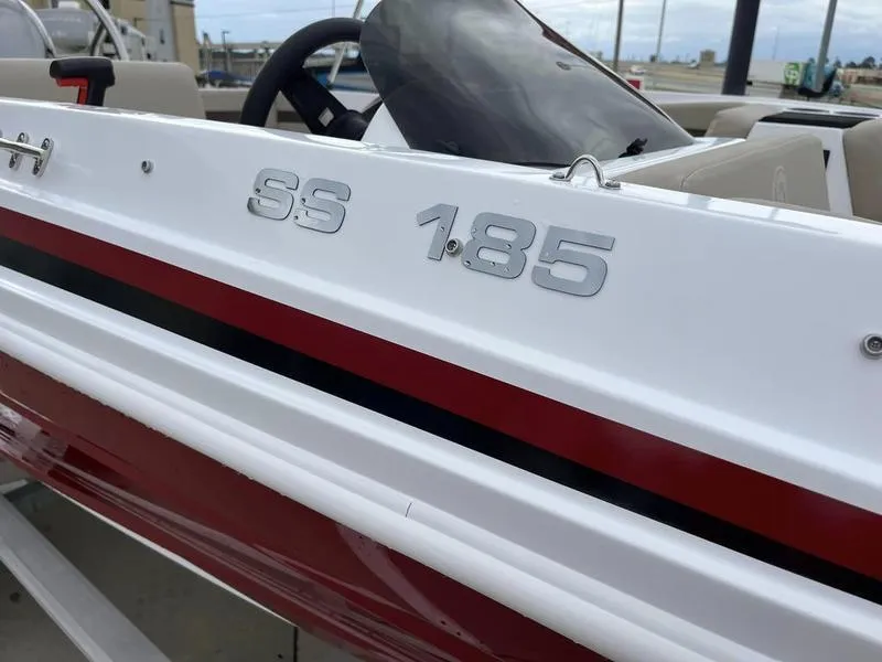 Slide: The Image of 2023 Hurricane SS185-OB boat with red and black stripes. - 5