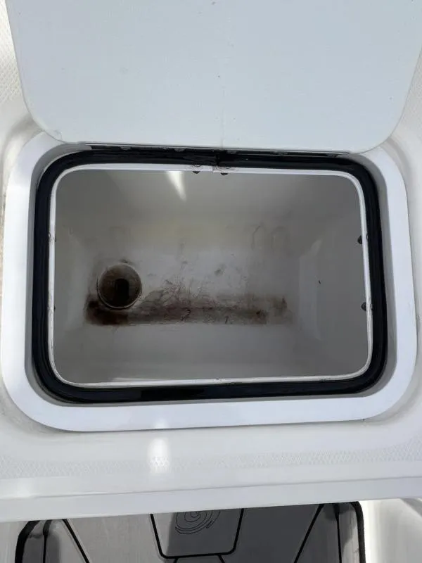 Slide: The Image of Open storage compartment in 2023 Hurricane SS205-IO 4.5 MPI boat. - 20