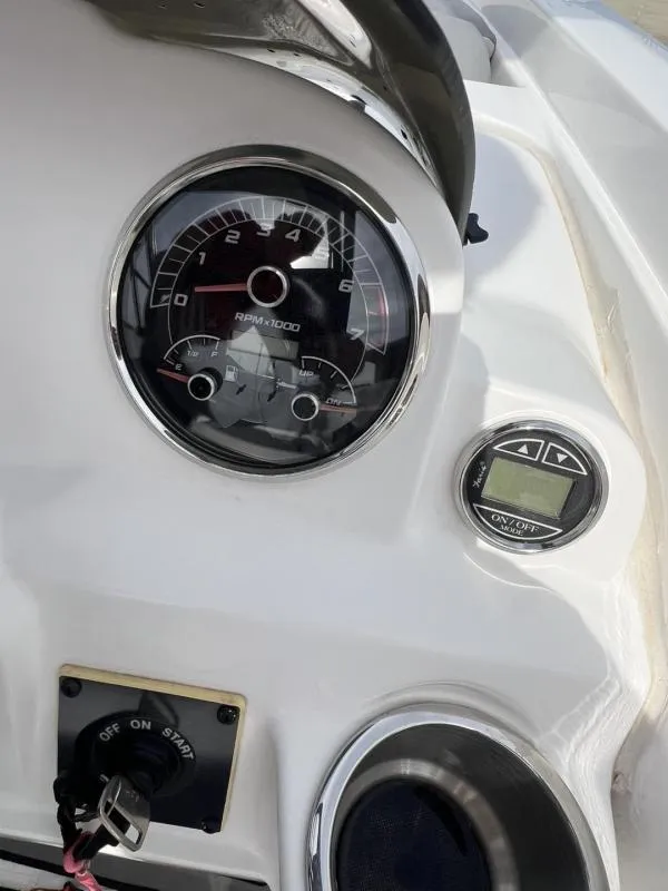 Slide: The Image of Dashboard of 2023 Hurricane SS205-IO 4.5 MPI boat with gauges and controls. - 23