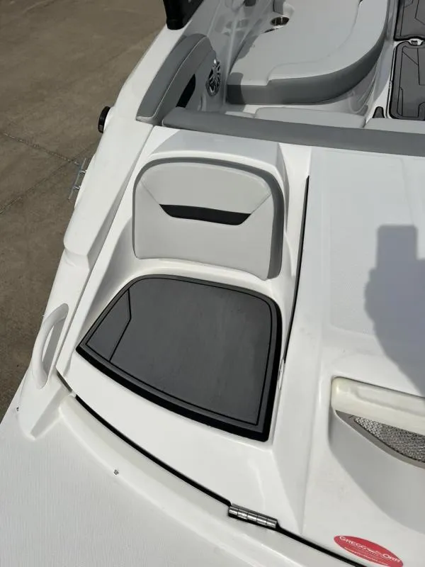 Slide: The Image of 2023 Hurricane SS205-IO 4.5 MPI boat interior, featuring sleek seating and storage compartments. - 9