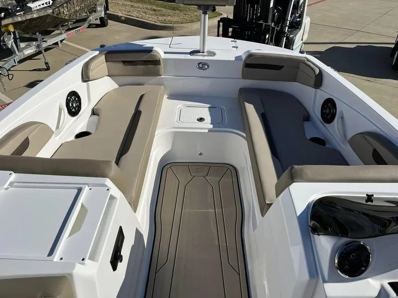 Slide: The Image of 2023 Hurricane SS205-OB boat interior with beige seating and modern design. - 19