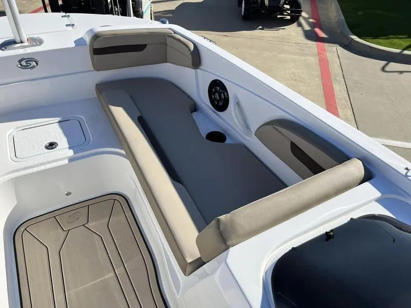 Slide: The Image of 2023 Hurricane SS205-OB boat interior with cushioned seating and storage compartments. - 20