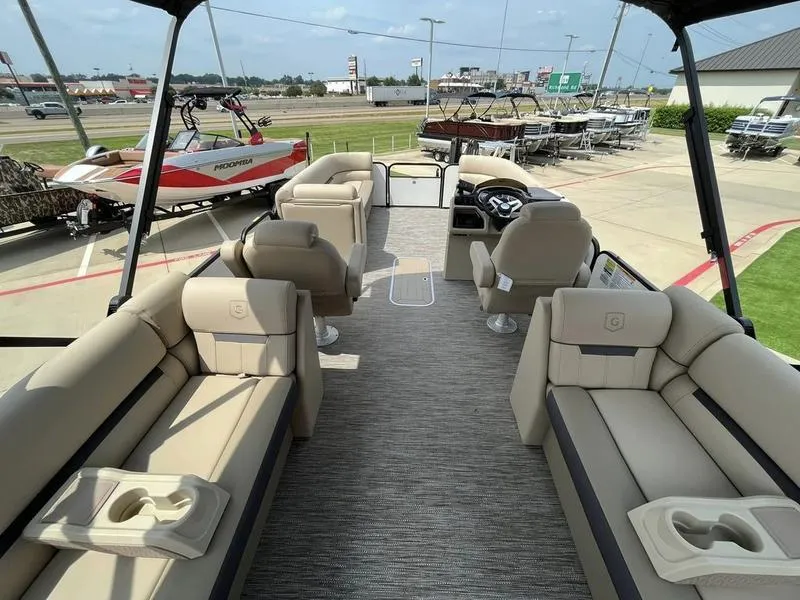 Slide: The Image of 2023 Godfrey Sweetwater 2286SB pontoon boat with beige seating and modern interior. - 18