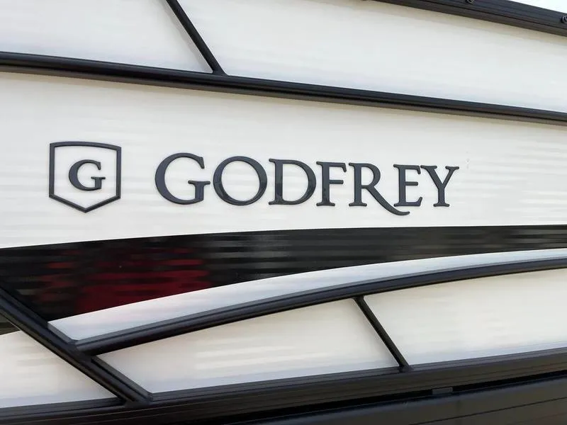 Slide: The Image of 2023 Godfrey Sweetwater 2286SB boat logo and branding. - 4