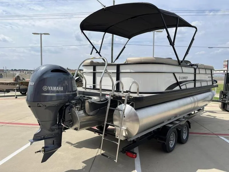 Slide: The Image of 2023 Godfrey Sweetwater 2286SB pontoon boat with Yamaha outboard motor on trailer. - 5
