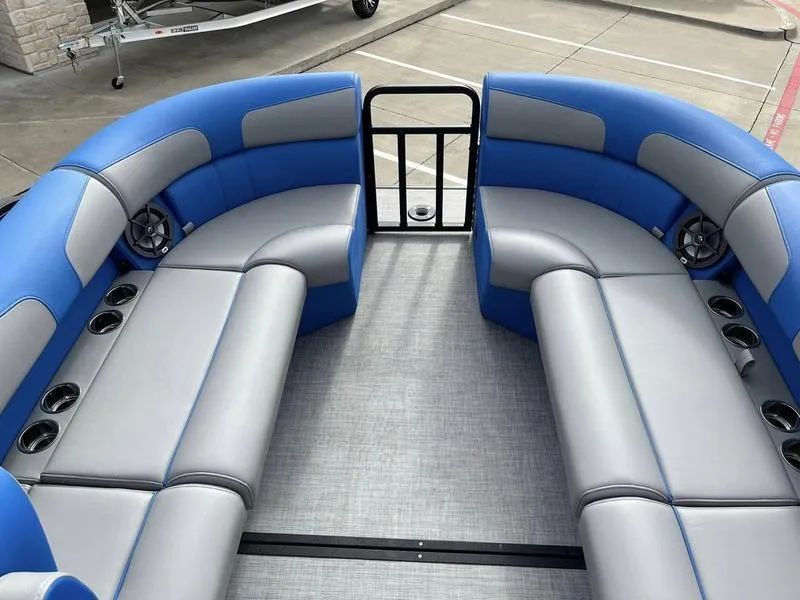 Slide: The Image of 2023 Montara Surf Boss boat interior with blue and gray seating. - 16