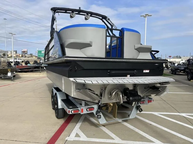 Slide: The Image of 2023 Montara Surf Boss boat on a trailer, rear view. - 9