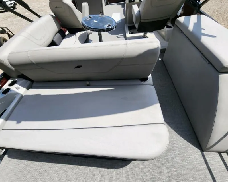 Slide: The Image of 2024 Starcraft SLS-5 Q DH boat interior with plush seating and table. - 10