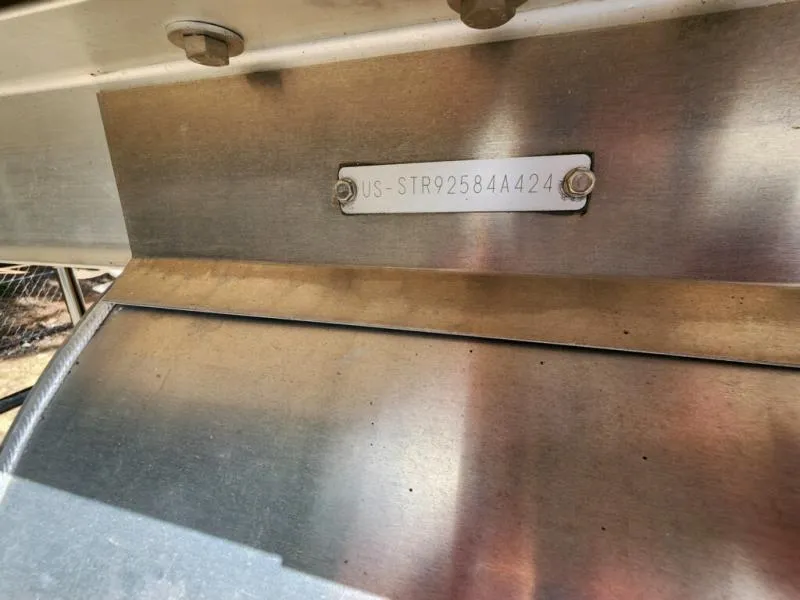 Slide: The Image of 2024 Starcraft SLS-5 Q DH metal identification plate with serial number. - 12