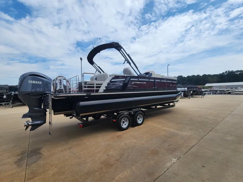 Slide: The Image of 2024 Starcraft SLS-5 Q DH pontoon boat with Yamaha engine on trailer. - 3