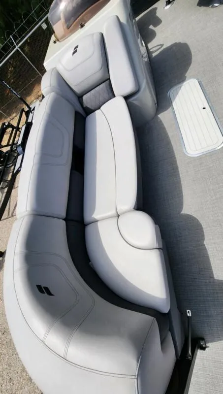 Slide: The Image of 2024 Starcraft SLS-5 Q DH boat with sleek, modern seating design. - 7