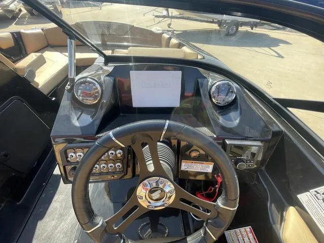 Slide: The Image of 2023 Heyday WT-2DC boat dashboard with steering wheel and control panel. - 8
