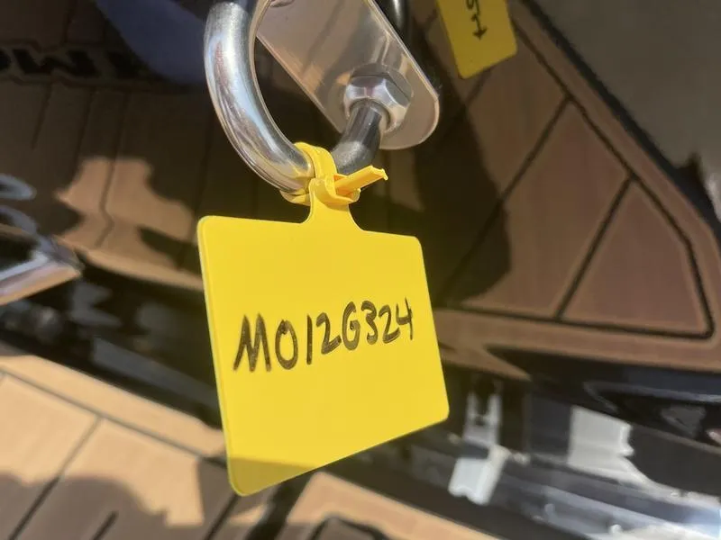 Slide: The Image of Yellow tag on 2024 Moomba Craz boat with code MO12G324. - 12