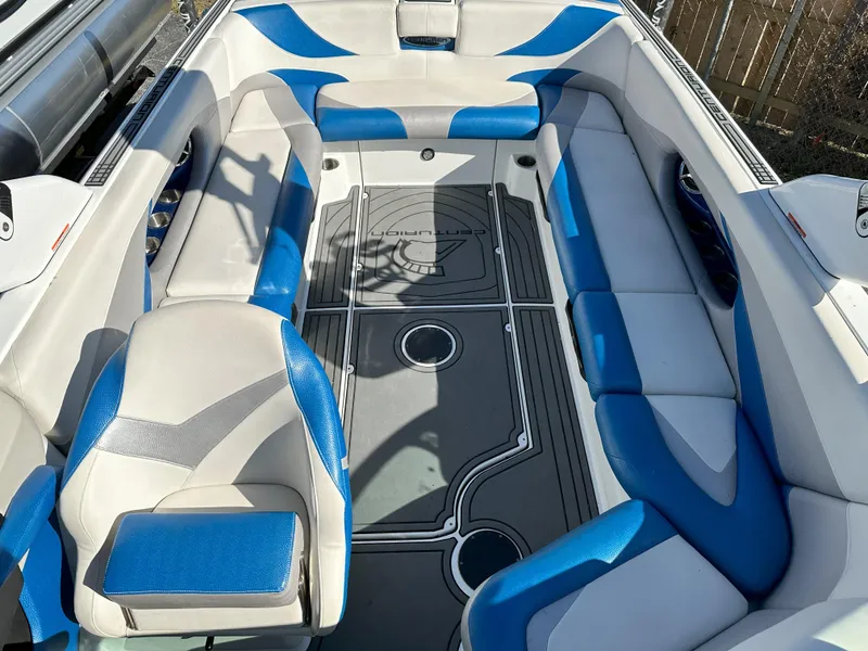 Slide: The Image of 2016 Centurion FS44 boat interior with blue and white seating. - 10