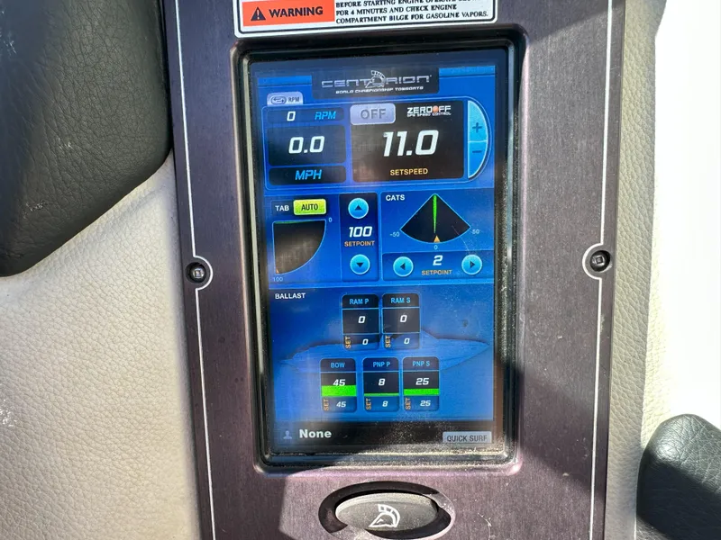 Slide: The Image of 2016 Centurion FS44 boat control panel display showing speed, RPM, and ballast settings. - 13