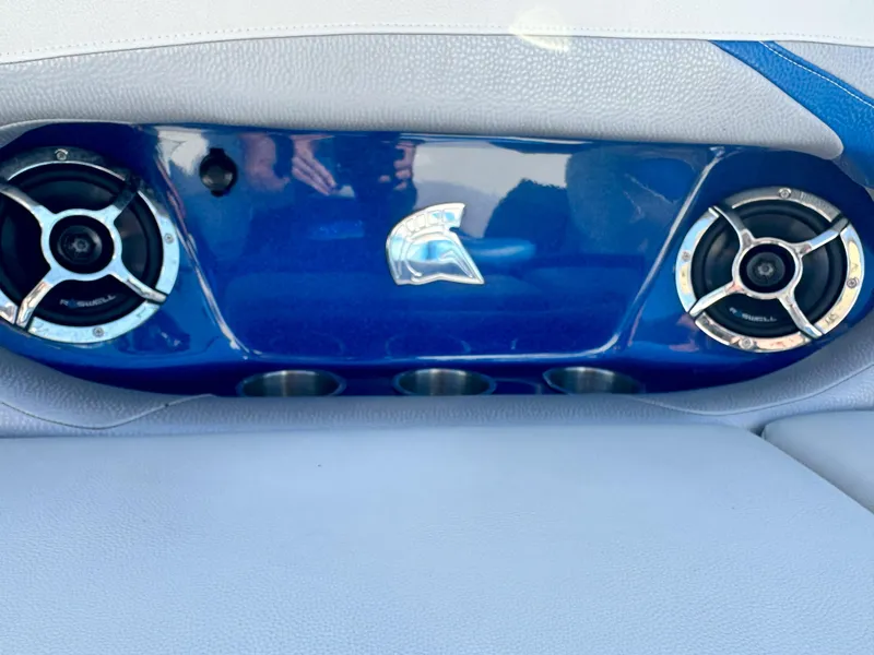 Slide: The Image of 2016 Centurion FS44 boat interior with blue panel and speakers. - 6