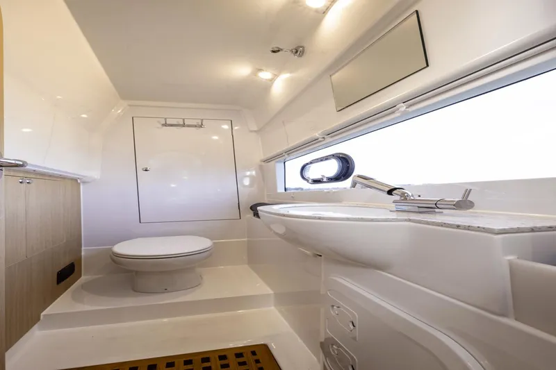 Slide: The Image of 2024 Aquila 36 Sport yacht bathroom with modern fixtures and sleek design. - 10