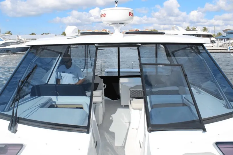 Slide: The Image of 2024 Aquila 36 Sport boat with spacious cockpit and modern design on the water. - 5