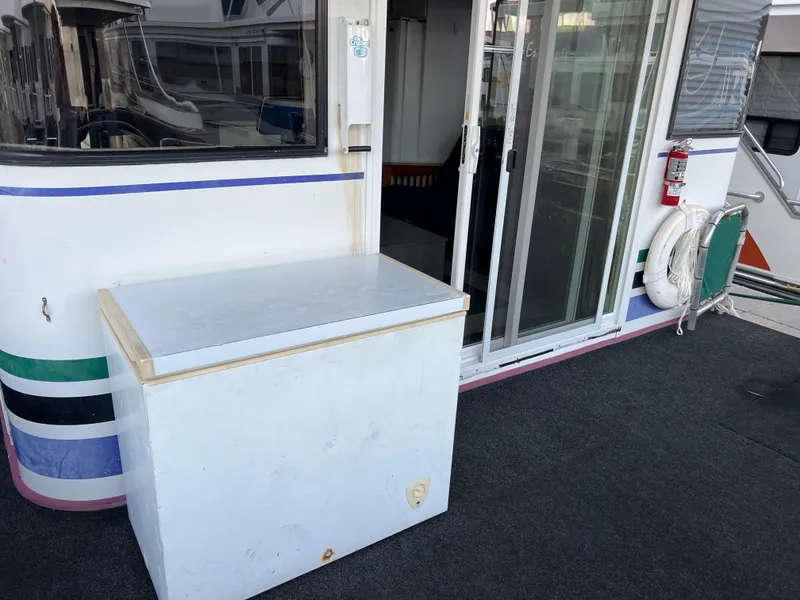 Slide: The Image of 1998 Custom Escalante share #8 boat deck with storage box and sliding door - 3
