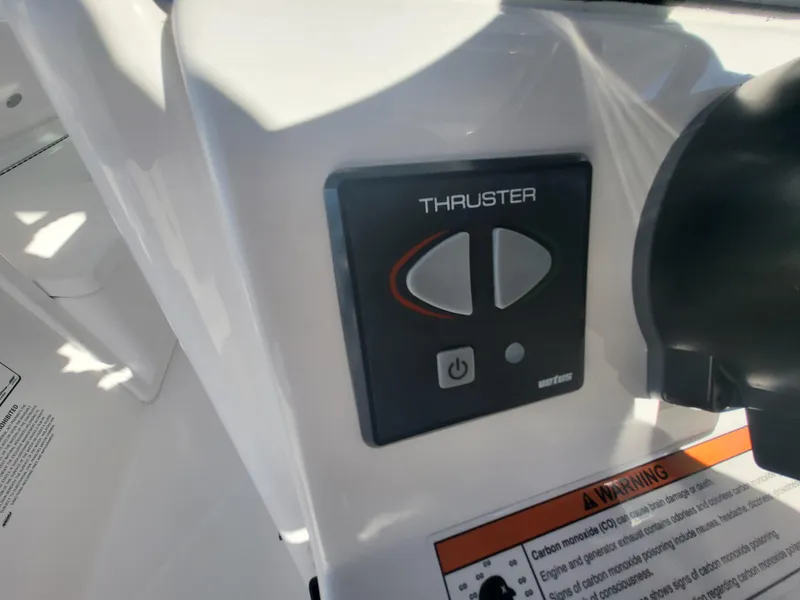 Slide: The Image of Control panel of a 2018 Everglades 360 LXC boat thruster system. - 18