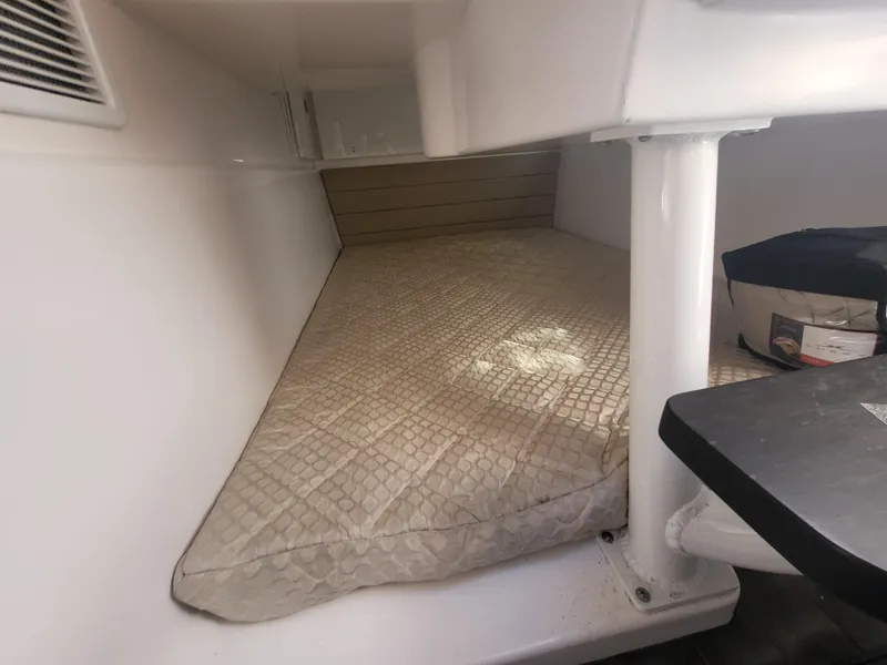Slide: The Image of 2018 Everglades 360 LXC cabin bed with beige mattress. - 24