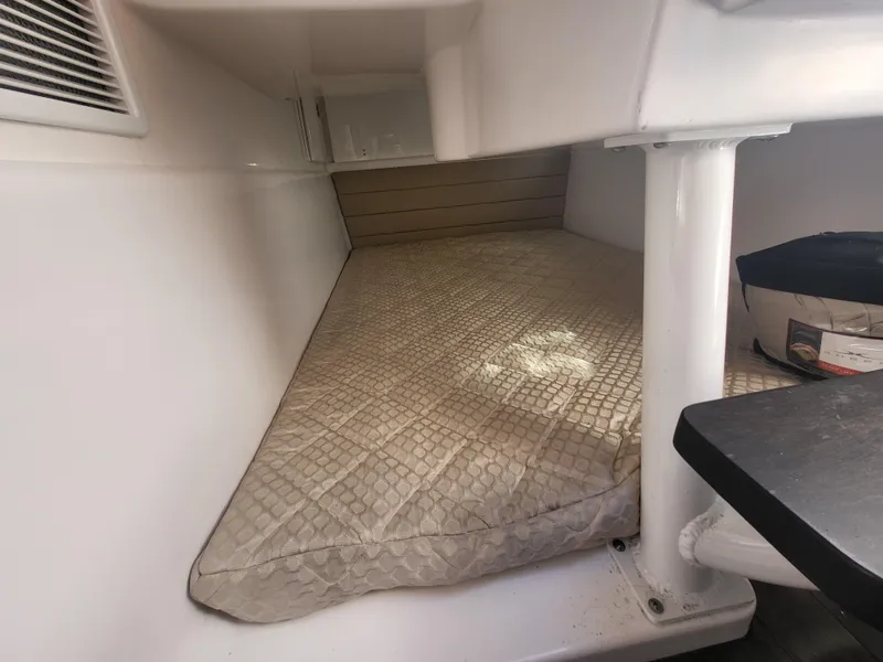 Slide: The Image of 2018 Everglades 360 LXC cabin bed with beige mattress. - 26