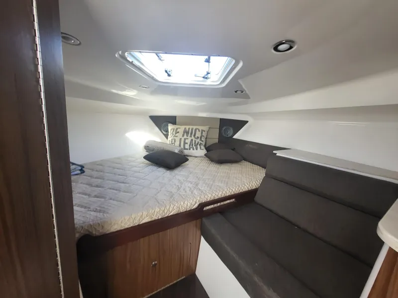 Slide: The Image of 2018 Everglades 360 LXC cabin with bed, skylight, and seating area. - 31