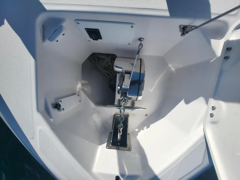 Slide: The Image of 2018 Everglades 360 LXC anchor locker with windlass and chain. - 38