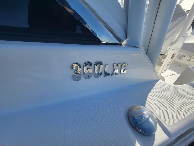 Slide: The Image of 2018 Everglades 360 LXC boat model nameplate and deck detail. - 8