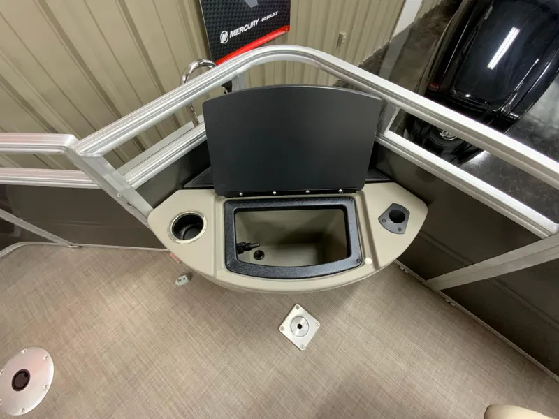 Slide: The Image of 2024 Sun Tracker Fishin' Barge 20 DLX fishing station with storage compartment and cup holder. - 11